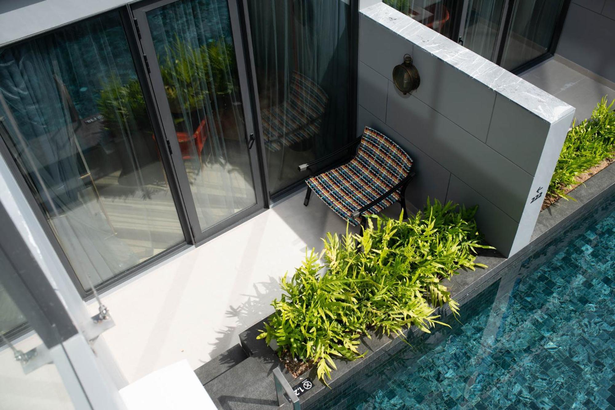 Hotel Indigo Phuket Patong By Ihg Экстерьер фото A private pool at a landed property in Singapore